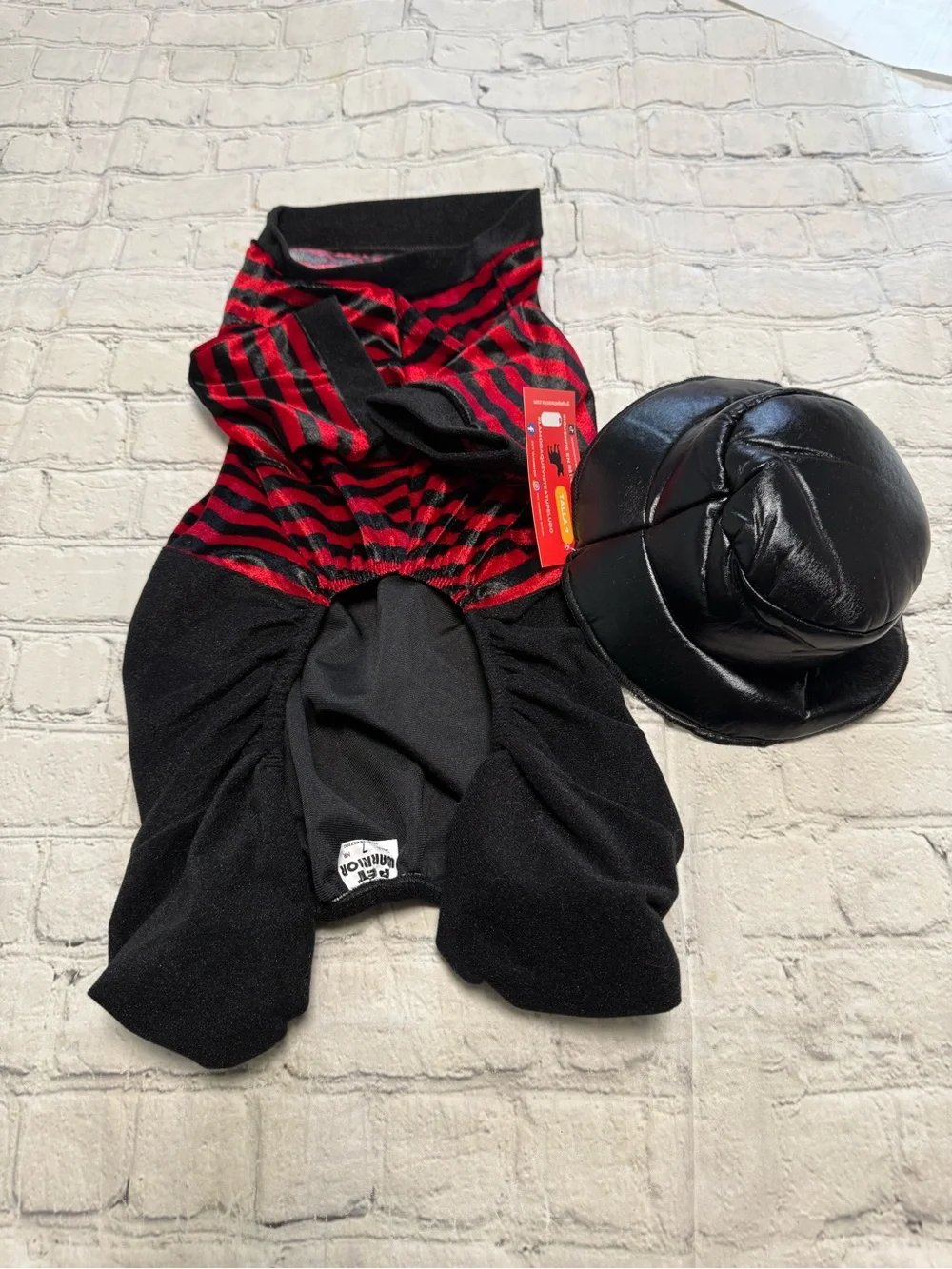 Pet Warrior Dog Striped Red & Black shirt and black pants custome. Halloween co